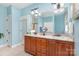 Double vanity bathroom with granite countertops and a large mirror at 1313 Western Hills Ln, Vale, NC 28168