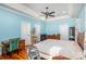 Spacious bedroom with hardwood floors and ceiling fan at 1313 Western Hills Ln, Vale, NC 28168