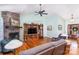 Spacious living room with stone fireplace and hardwood floors at 1313 Western Hills Ln, Vale, NC 28168