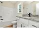 Bright bathroom showcasing a granite countertop, white cabinetry, and a tiled shower at 1323 Christopher Cir, Rock Hill, SC 29730