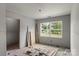 Unfinished bedroom with drywall and a view of the front yard showing new construction at 1323 Christopher Cir, Rock Hill, SC 29730