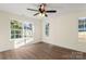 Sun-filled bedroom featuring new flooring and large windows with natural light at 1323 Christopher Cir, Rock Hill, SC 29730