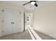 Carpeted bedroom with a closet and a door to another room at 1323 Christopher Cir, Rock Hill, SC 29730