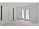 Bright bedroom features doors, a glass door to outdoors, and ample natural light at 1323 Christopher Cir, Rock Hill, SC 29730