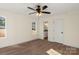 Bright bedroom with a ceiling fan, new floors, and an ensuite bathroom at 1323 Christopher Cir, Rock Hill, SC 29730