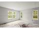 Unfinished bedroom with drywall and lots of natural light showing new construction at 1323 Christopher Cir, Rock Hill, SC 29730