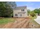Back exterior view of the home with a two-story addition at 1323 Christopher Cir, Rock Hill, SC 29730