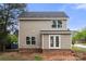 Back view of a two-story home with gray vinyl siding at 1323 Christopher Cir, Rock Hill, SC 29730