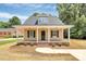 Charming home with a welcoming front porch and black shutters at 1323 Christopher Cir, Rock Hill, SC 29730
