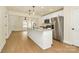 Modern kitchen features stainless steel appliances, granite countertops, and an island with pendant lighting at 1323 Christopher Cir, Rock Hill, SC 29730
