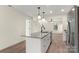 Open concept kitchen with granite counters, stainless appliances, and views to the living area at 1323 Christopher Cir, Rock Hill, SC 29730