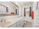 Clean bathroom with double vanity, large mirror, and updated fixtures at 144 Mcmillian Heights Rd, Iron Station, NC 28080