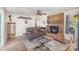 Living room with fireplace, seating and wood flooring at 144 Mcmillian Heights Rd, Iron Station, NC 28080