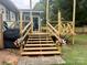 Deck with stairs leading to backyard at 1535 Rolling Meadow Ln, Gastonia, NC 28054