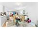 Bright dining room features a wood table and patterned chairs at 1535 Rolling Meadow Ln, Gastonia, NC 28054