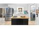 Modern kitchen with stainless steel appliances and an island at 1535 Rolling Meadow Ln, Gastonia, NC 28054