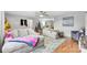 Bright living room featuring plush sofas and hardwood floors at 1535 Rolling Meadow Ln, Gastonia, NC 28054