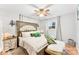 Spacious main bedroom with a king-size bed and ceiling fan at 1535 Rolling Meadow Ln, Gastonia, NC 28054