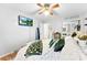 Main bedroom with large TV, king bed and ceiling fan at 1535 Rolling Meadow Ln, Gastonia, NC 28054