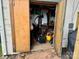 Outdoor storage shed with various items at 1535 Rolling Meadow Ln, Gastonia, NC 28054