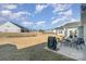 Private backyard with patio, grill, and seating area at 194 Tillery Ln, Mount Gilead, NC 27306