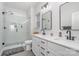 Modern bathroom with double vanity, walk-in shower, and updated fixtures at 194 Tillery Ln, Mount Gilead, NC 27306