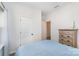 Light and airy bedroom with a full-size bed and a view of the backyard at 194 Tillery Ln, Mount Gilead, NC 27306
