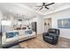 Spacious living room with hardwood floors, comfortable seating, and open concept at 194 Tillery Ln, Mount Gilead, NC 27306