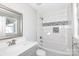 Updated bathroom with subway tile and gray vanity at 207 Lee St, Fort Mill, SC 29715