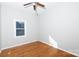 Well-lit bedroom with hardwood floors and ceiling fan at 207 Lee St, Fort Mill, SC 29715