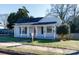 Charming bungalow with front porch and well-maintained lawn at 207 Lee St, Fort Mill, SC 29715