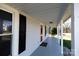 Covered front porch with access to the front door at 207 Lee St, Fort Mill, SC 29715