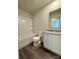Bathroom featuring granite countertop, tile floors, and shower over tub at 2210 Cranberry Way, Salisbury, NC 28147