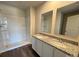 Bathroom features double sinks, granite countertop, and shower over tub at 2210 Cranberry Way, Salisbury, NC 28147