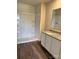 Bathroom features granite countertop, tile floors, and shower over tub at 2210 Cranberry Way, Salisbury, NC 28147