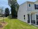 Townhome exterior features an easy-to-maintain lawn and desirable neighborhood at 2210 Cranberry Way, Salisbury, NC 28147