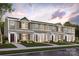 New townhome community with 3-unit buildings, featuring attractive landscaping and neutral color palette at 2210 Cranberry Way, Salisbury, NC 28147