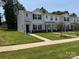 Charming townhome features a well-manicured lawn and appealing curb appeal at 2210 Cranberry Way, Salisbury, NC 28147