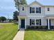 Inviting townhome showcases a tidy lawn and an attractive front entrance at 2210 Cranberry Way, Salisbury, NC 28147