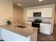 Stylish kitchen with stainless steel appliances, granite countertops, and ample cabinet space at 2210 Cranberry Way, Salisbury, NC 28147