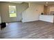 Bright living area features durable wood flooring and lots of natural light at 2210 Cranberry Way, Salisbury, NC 28147