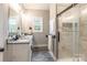 Bathroom with double vanity, granite countertop, and walk-in shower at 2434 Wo Gladden Rd, Chester, SC 29706