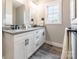 Double vanity bathroom with granite countertop and gray-toned flooring at 2434 Wo Gladden Rd, Chester, SC 29706