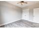 Bedroom with double doors and wood-look floors at 2434 Wo Gladden Rd, Chester, SC 29706
