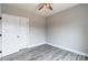Bedroom with double doors and wood-look floors at 2434 Wo Gladden Rd, Chester, SC 29706