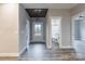 Bright entryway with gray flooring and a view into the bathroom at 2434 Wo Gladden Rd, Chester, SC 29706