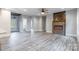 Living room with gray flooring, fireplace, and access to kitchen at 2434 Wo Gladden Rd, Chester, SC 29706