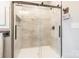 Walk-in shower with glass enclosure and neutral tile at 2434 Wo Gladden Rd, Chester, SC 29706