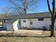 Newly painted home with a spacious backyard and patio at 3225 Cricketeer Dr, Charlotte, NC 28216