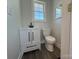 Small bathroom with white vanity and toilet at 3225 Cricketeer Dr, Charlotte, NC 28216